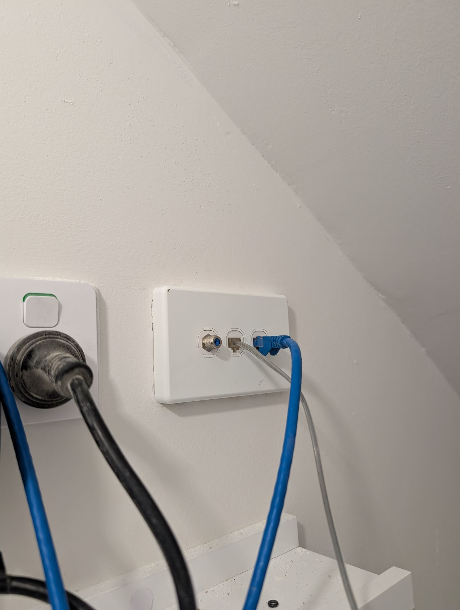 PoE network switch and patch wall plate